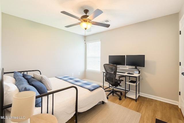 1177 Chestnut Dr, Southaven, MS 38671 - bedroom featuring wood finished floors and a ceiling fan
