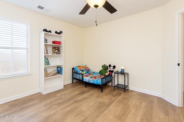 1177 Chestnut Dr, Southaven, MS 38671 - sitting room with light wood-style floors, a ceiling fan, and healthy amount of natural light