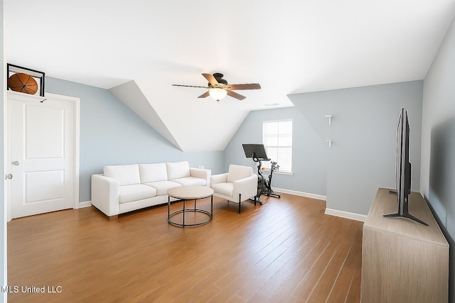 1177 Chestnut Dr, Southaven, MS 38671 - living room featuring a ceiling fan, wood finished floors, and vaulted ceiling