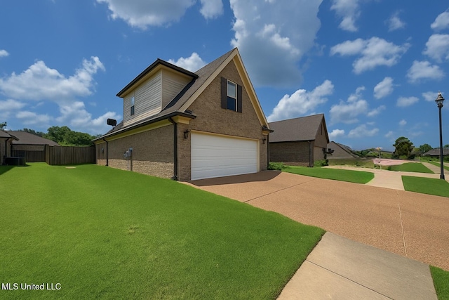 1177 Chestnut Dr, Southaven, MS 38671 - view of side of home featuring a garage, driveway, and brick siding