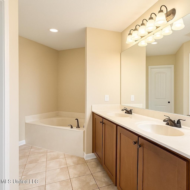 1177 Chestnut Dr, Southaven, MS 38671 - full bath featuring double vanity, tile patterned floors, a garden tub, and recessed lighting