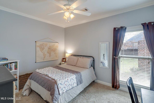 carpeted bedroom featuring a ceiling fan, baseboards, visible vents, and ornamental molding