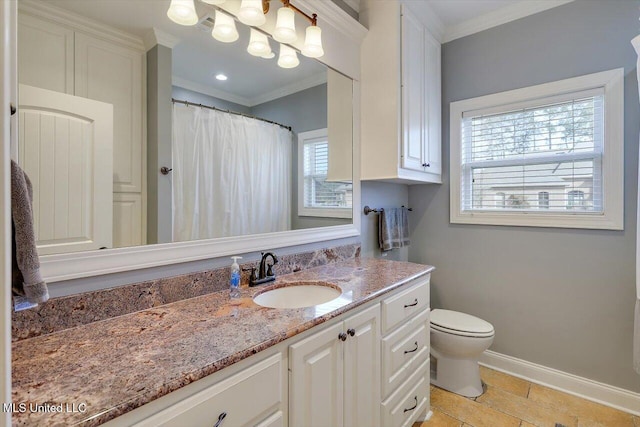 full bath featuring baseboards, vanity, crown molding, and toilet