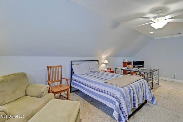 carpeted bedroom featuring visible vents, baseboards, a ceiling fan, and vaulted ceiling