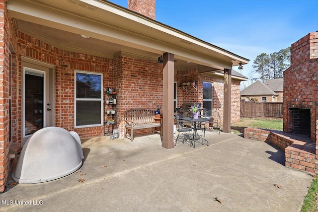 view of patio with fence