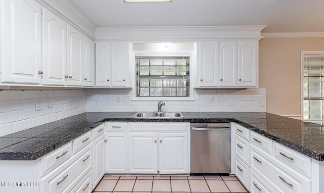 kitchen with white cabinets, a healthy amount of sunlight, stainless steel dishwasher, and sink