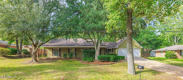 ranch-style home featuring concrete driveway, a front lawn, and a garage