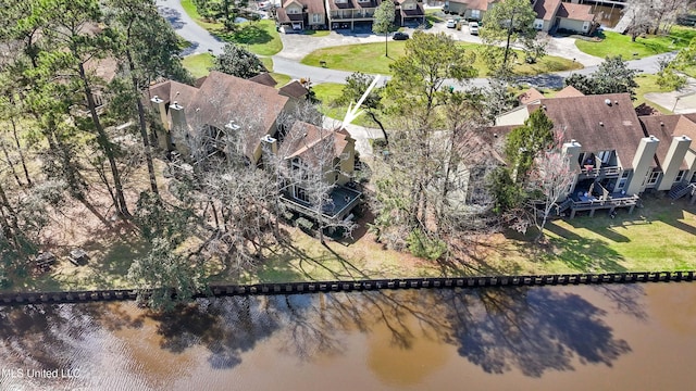 bird's eye view featuring a residential view and a water view