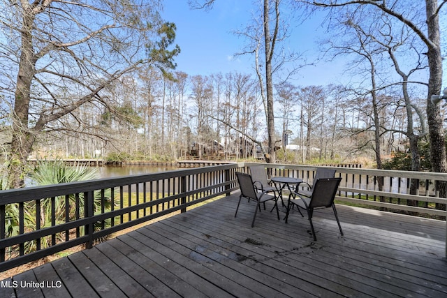 deck featuring a water view