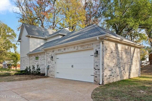 view of property exterior with a garage