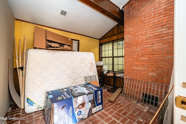 kitchen featuring vaulted ceiling with beams and brick floor