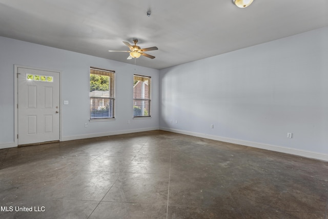 2948 Magnolia Ct, Gulfport, MS 39507 - unfurnished room with a ceiling fan, concrete floors, and baseboards