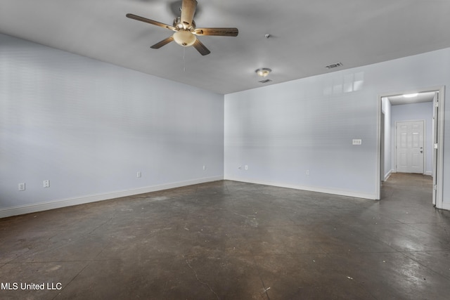 2948 Magnolia Ct, Gulfport, MS 39507 - spare room featuring a ceiling fan, baseboards, and concrete flooring