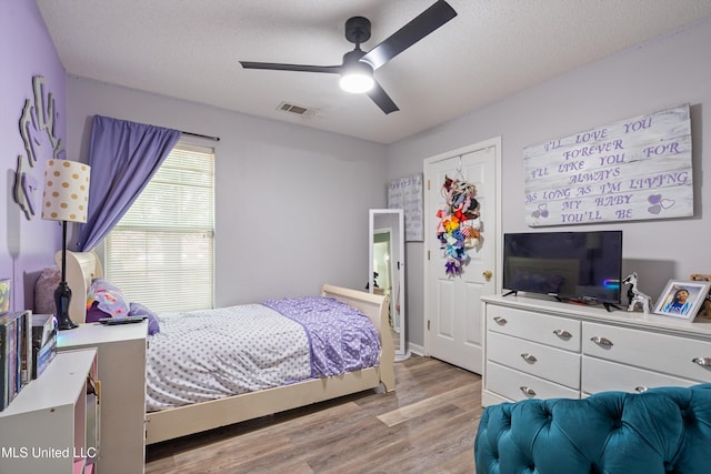 9884 Victor Dr, Olive Branch, MS 38654 - bedroom featuring light wood-style flooring and ceiling fan