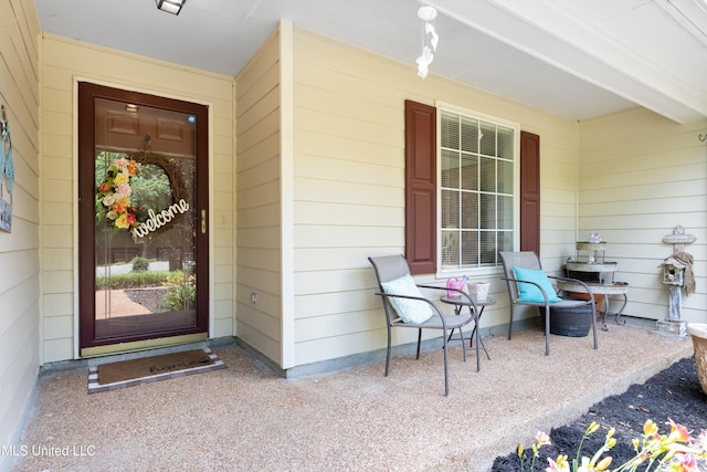 9884 Victor Dr, Olive Branch, MS 38654 - doorway to property featuring covered porch