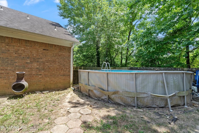 9884 Victor Dr, Olive Branch, MS 38654 - view of yard featuring an outdoor pool