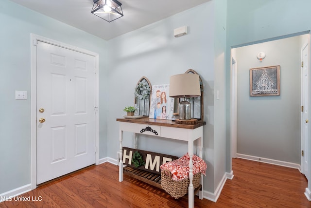 9884 Victor Dr, Olive Branch, MS 38654 - entrance foyer with wood finished floors and baseboards
