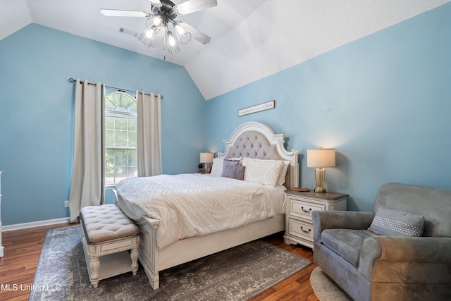 9884 Victor Dr, Olive Branch, MS 38654 - bedroom featuring lofted ceiling, wood finished floors, baseboards, and ceiling fan
