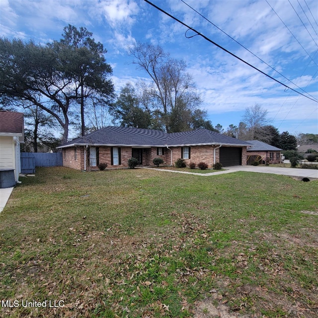 ranch-style house featuring brick siding, fence, a garage, driveway, and a front lawn