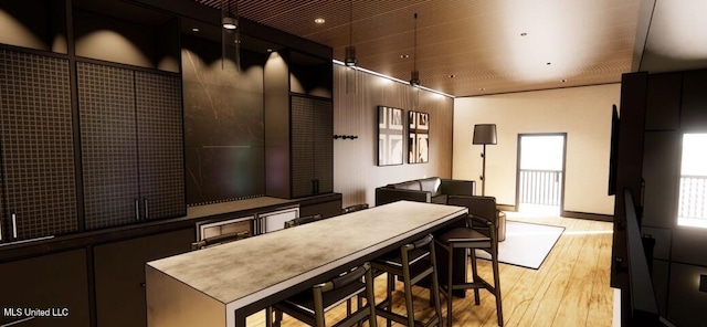 kitchen featuring a center island and light hardwood / wood-style flooring