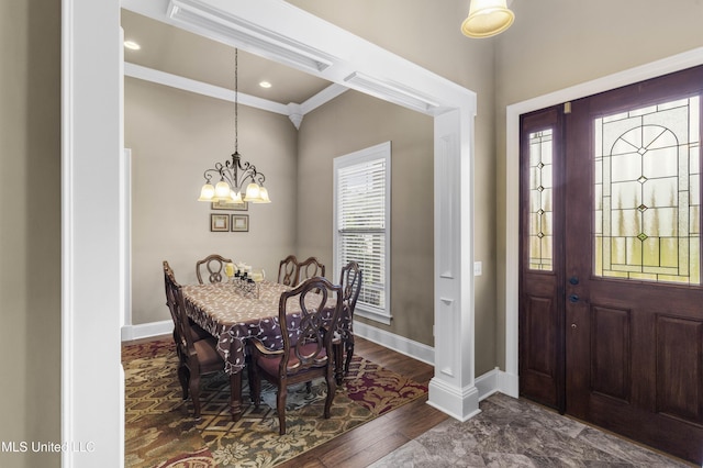 705 Brookwood Cir, Brandon, MS 39042 - foyer entrance featuring crown molding, a chandelier, baseboards, and dark wood finished floors