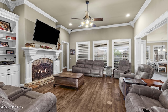 705 Brookwood Cir, Brandon, MS 39042 - living room featuring dark wood-style flooring, ceiling fan, a brick fireplace, recessed lighting, and ornamental molding