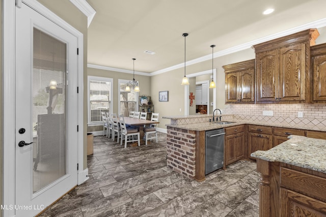 705 Brookwood Cir, Brandon, MS 39042 - kitchen featuring a sink, stainless steel dishwasher, decorative backsplash, pendant lighting, and baseboards
