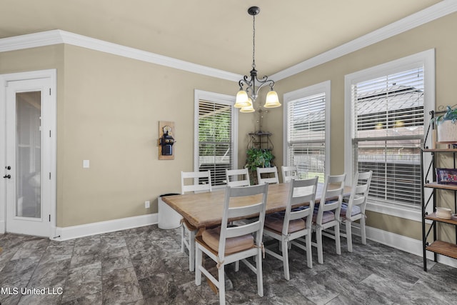 705 Brookwood Cir, Brandon, MS 39042 - dining area featuring baseboards, crown molding, and a chandelier