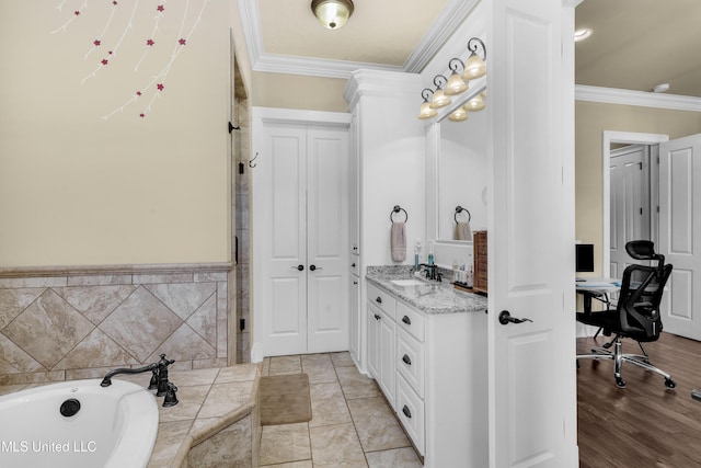 705 Brookwood Cir, Brandon, MS 39042 - full bathroom with ornamental molding, vanity, and a garden tub