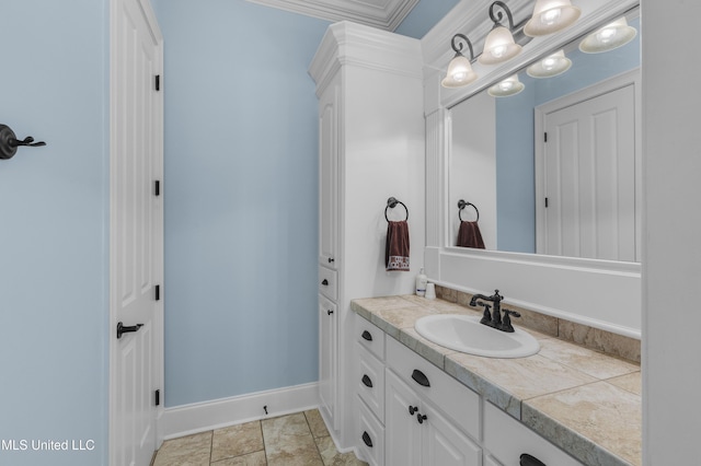 705 Brookwood Cir, Brandon, MS 39042 - bathroom featuring vanity, ornamental molding, and baseboards
