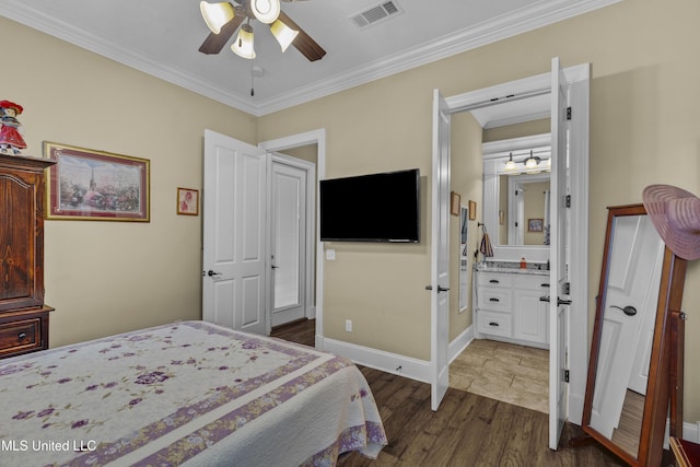 705 Brookwood Cir, Brandon, MS 39042 - bedroom with wood finished floors, ornamental molding, ensuite bath, and a ceiling fan