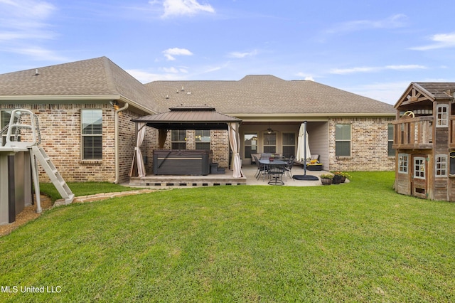 705 Brookwood Cir, Brandon, MS 39042 - rear view of property with brick siding, a gazebo, a patio area, roof with shingles, and a yard