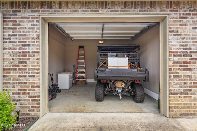 705 Brookwood Cir, Brandon, MS 39042 - garage featuring refrigerator