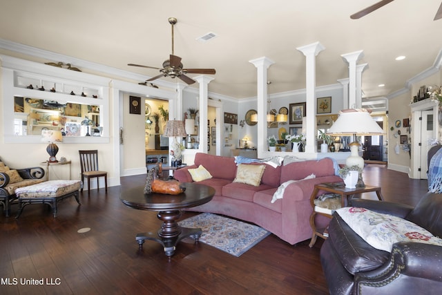 living room with hardwood / wood-style flooring, ceiling fan, crown molding, and decorative columns