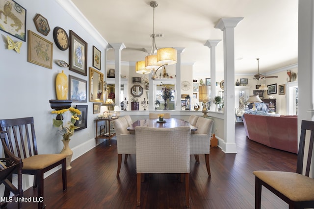 dining space with dark hardwood / wood-style floors, ceiling fan, ornate columns, and crown molding