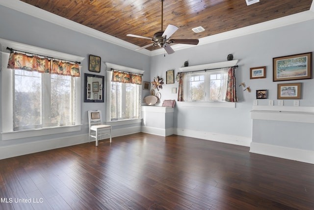 unfurnished room featuring dark hardwood / wood-style floors, plenty of natural light, and ceiling fan