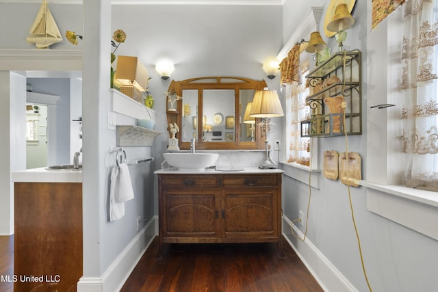 kitchen with dark hardwood / wood-style floors and sink