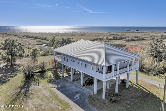 drone / aerial view featuring a water view