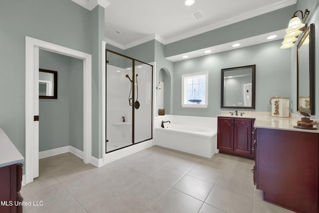 bathroom with vanity, a garden tub, visible vents, and a stall shower