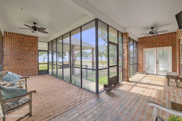 sunroom / solarium with ceiling fan