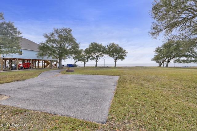 view of yard featuring a carport