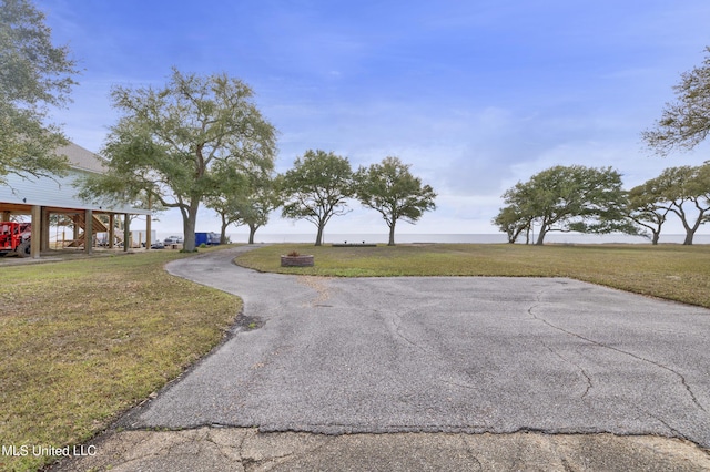 view of road featuring driveway