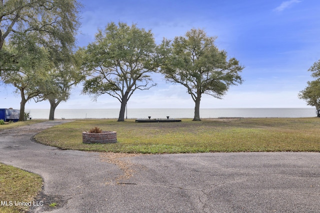 exterior space with a water view