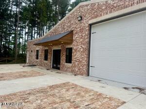 view of property exterior featuring a garage