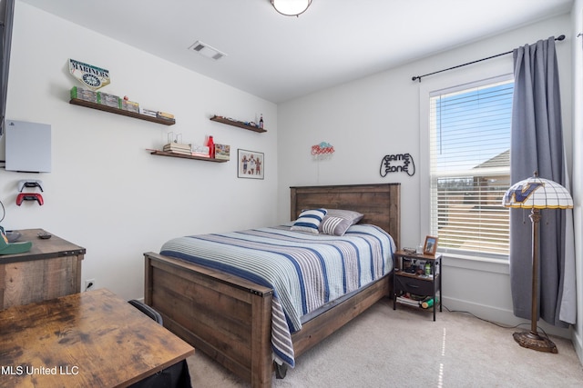 bedroom with carpet flooring and visible vents