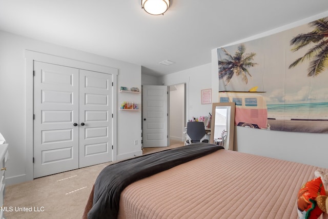 carpeted bedroom with a closet