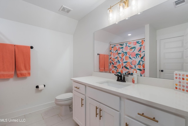 bathroom with visible vents, toilet, vanity, and baseboards