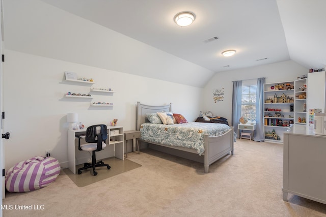 bedroom with lofted ceiling, light colored carpet, and visible vents