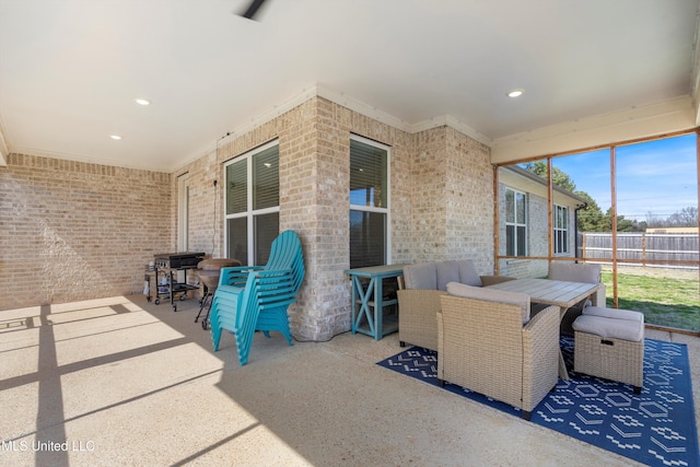 view of patio / terrace featuring fence