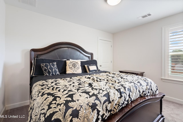 bedroom featuring carpet flooring